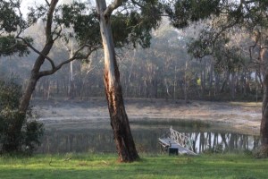 dam-with-mist-rising-from-the-surface-of-the-water